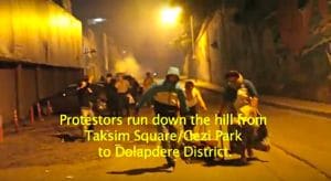 Protestors-Run-Down-A-Hill-Gezi-Park
